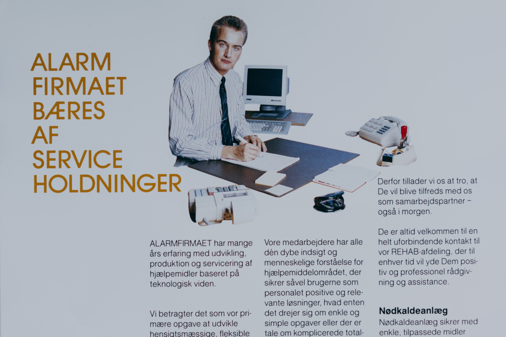 Et billede af Jørn, der er med i en firmabrochure i starten af sin karriere Jørn brochure